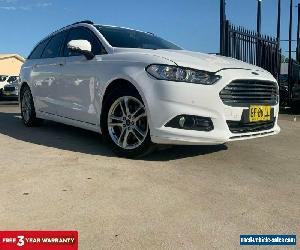 2015 Ford Mondeo MD Ambiente Wagon 5dr PwrShift 6sp, 2.0DT [Jun] Winter White A